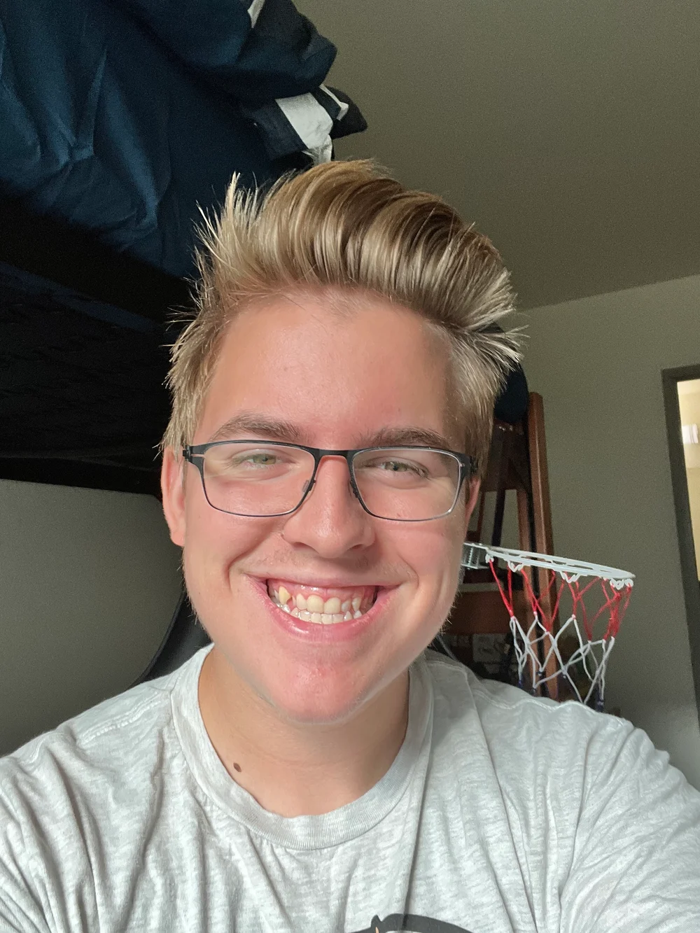 A smiling portrait of Joshua Sharpe